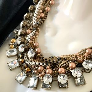 Braided multi strand chain necklace.